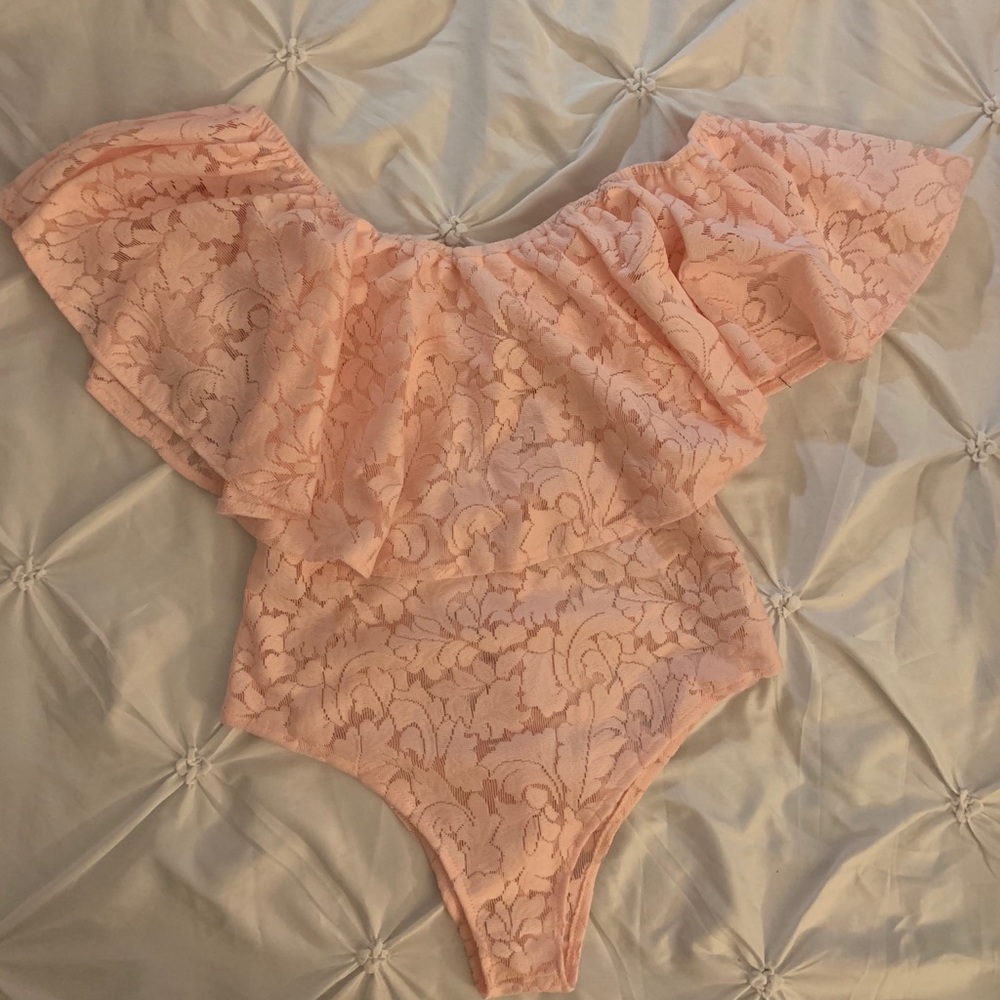 Pink lace body suit